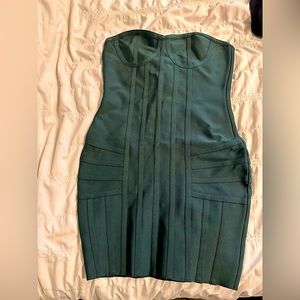 Beautiful emerald green Oh Polly Bandage corset style dress